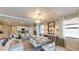 Open concept dining room with kitchen view and tray ceiling at 14952 Serene Shores Loop, Lakewood Ranch, FL 34211