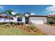 Two-story home with brick driveway and landscaped lawn at 14952 Serene Shores Loop, Lakewood Ranch, FL 34211