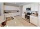 Modern kitchen with white cabinets and granite countertops at 14952 Serene Shores Loop, Lakewood Ranch, FL 34211