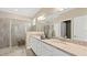 Elegant bathroom with double vanity, granite countertop, and large shower at 15053 Sea Salt Way, Bradenton, FL 34211