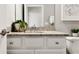 White vanity with granite countertop and chrome fixtures at 15053 Sea Salt Way, Bradenton, FL 34211