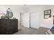 Guest bedroom with double door closet at 15218 Serene Shores Loop, Bradenton, FL 34211