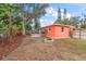 Backyard with firepit and wooden deck at 1530 Rollen Rd, Clearwater, FL 33755