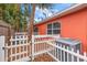 Backyard with a white picket fence, and AC unit at 1530 Rollen Rd, Clearwater, FL 33755