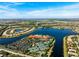 Bird's-eye view of community, highlighting lake and amenities at 15707 Crystal Waters Dr, Wimauma, FL 33598