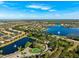 Community overview featuring lake, entrance, and homes at 15707 Crystal Waters Dr, Wimauma, FL 33598