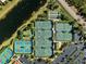 Aerial view of well-maintained tennis and pickleball courts at 15707 Crystal Waters Dr, Wimauma, FL 33598