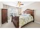 Spacious bedroom with a large bed and plenty of natural light at 15767 Crystal Waters Dr, Wimauma, FL 33598