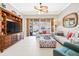 Comfortable living room featuring a neutral color palette and ample natural light at 15767 Crystal Waters Dr, Wimauma, FL 33598