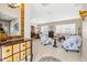 Bright living room with tiled floors and comfy seating at 15767 Crystal Waters Dr, Wimauma, FL 33598