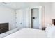 Bedroom with white bedding and a built-in closet at 160 174Th Terrace E Dr # B, Redington Shores, FL 33708