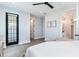 Main bedroom with ensuite bathroom and private balcony at 160 174Th Terrace E Dr # B, Redington Shores, FL 33708