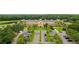 Aerial view of a large yellow building with parking lot at 16104 Stowe Ct, Tampa, FL 33647