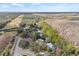 Aerial view of a house nestled in a wooded neighborhood at 16104 Stowe Ct, Tampa, FL 33647