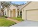 Brick walkway leading to a freshly painted house at 16104 Stowe Ct, Tampa, FL 33647