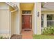 Elegant front door entry with a brick walkway at 16104 Stowe Ct, Tampa, FL 33647