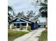 Quaint blue house with white trim and a welcoming front porch at 1815 2Nd E Ave, Bradenton, FL 34208