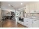 Spacious kitchen featuring stainless steel appliances and granite countertops at 18803 15Th St, Lutz, FL 33549