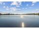 Scenic view of a calm lake under a bright sky at 18803 15Th St, Lutz, FL 33549