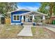 Quaint blue house with a front porch at 207 E Selma Ave, Tampa, FL 33603