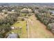 Wide shot of property showing home, large lot, and rural setting at 3009 Jim Johnson Rd, Plant City, FL 33566