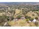 High-angle view of home, expansive land, and neighborhood at 3009 Jim Johnson Rd, Plant City, FL 33566