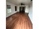 Hardwood floors and ceiling fan in living room at 3504 E 22Nd Ave, Tampa, FL 33605