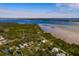 An aerial view of a waterfront home and its surroundings at 407 Bay View St, Safety Harbor, FL 34695