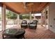 Relaxing screened porch with wicker furniture and brick flooring at 407 Bay View St, Safety Harbor, FL 34695