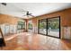 Bedroom with sliding door to patio and pool view at 431 Rafael Ne Blvd, St Petersburg, FL 33704