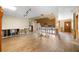 Open dining area with tile floors and exposed beams at 431 Rafael Ne Blvd, St Petersburg, FL 33704