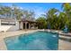 Inviting pool with patio and covered seating area at 431 Rafael Ne Blvd, St Petersburg, FL 33704