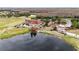 Aerial view of golf course clubhouse and pond at 4339 Cheval Blvd, Lutz, FL 33558