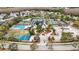 Aerial view of community amenities including tennis and basketball courts at 4339 Cheval Blvd, Lutz, FL 33558