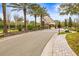 Gated entrance to community with guard house and landscaping at 4339 Cheval Blvd, Lutz, FL 33558