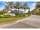 Gated community entrance with Cheval sign and landscaping at 4339 Cheval Blvd, Lutz, FL 33558