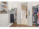 Spacious walk-in closet with ample shelving and hanging space at 4339 Cheval Blvd, Lutz, FL 33558