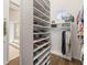 Large walk-in closet with custom shelving for shoes and clothes at 4339 Cheval Blvd, Lutz, FL 33558