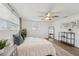 Bright bedroom with a king-size bed and modern decor at 4549 Madison St, New Port Richey, FL 34652