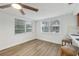 Bright dining area with wood flooring and a view to the kitchen at 4549 Madison St, New Port Richey, FL 34652