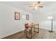 Bright home office features wood desk, chair, and floor lamp at 4549 Madison St, New Port Richey, FL 34652