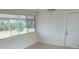 Bright Florida room with sliding doors to backyard at 4562 3Rd S Ave, St Petersburg, FL 33711