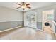 Dining area with tile floors and access to the back patio and laundry at 4920 Steel Dust Ln, Lutz, FL 33559