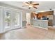 Dining area with tile floors and access to the back patio at 4920 Steel Dust Ln, Lutz, FL 33559