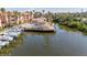 Beautiful scene of a waterway with a dock, pool, and gentle manatees swimming in the tranquil waters at 5000 Culbreath Key Way # 2-202, Tampa, FL 33611