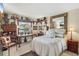 Bright bedroom with built-in shelving and sitting area at 5117 Lesher Ct, Tampa, FL 33624