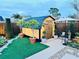 Well-maintained storage shed in a landscaped backyard setting at 5117 Lesher Ct, Tampa, FL 33624