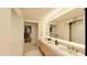 Spa-like bathroom with double vanity and large mirror at 5120 Marina Way # 30702, Tampa, FL 33611