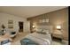 Bright bedroom with ensuite closet and comfortable seating area at 5120 Marina Way # 30702, Tampa, FL 33611