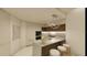 Modern kitchen features island with seating and stainless steel appliances at 5120 Marina Way # 30702, Tampa, FL 33611